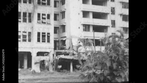 Fire Damage Manila 1946 - A multi-story building is damaged by fire after World War II   photo