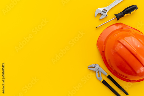 Engineer safety helmet with construction tools, top view