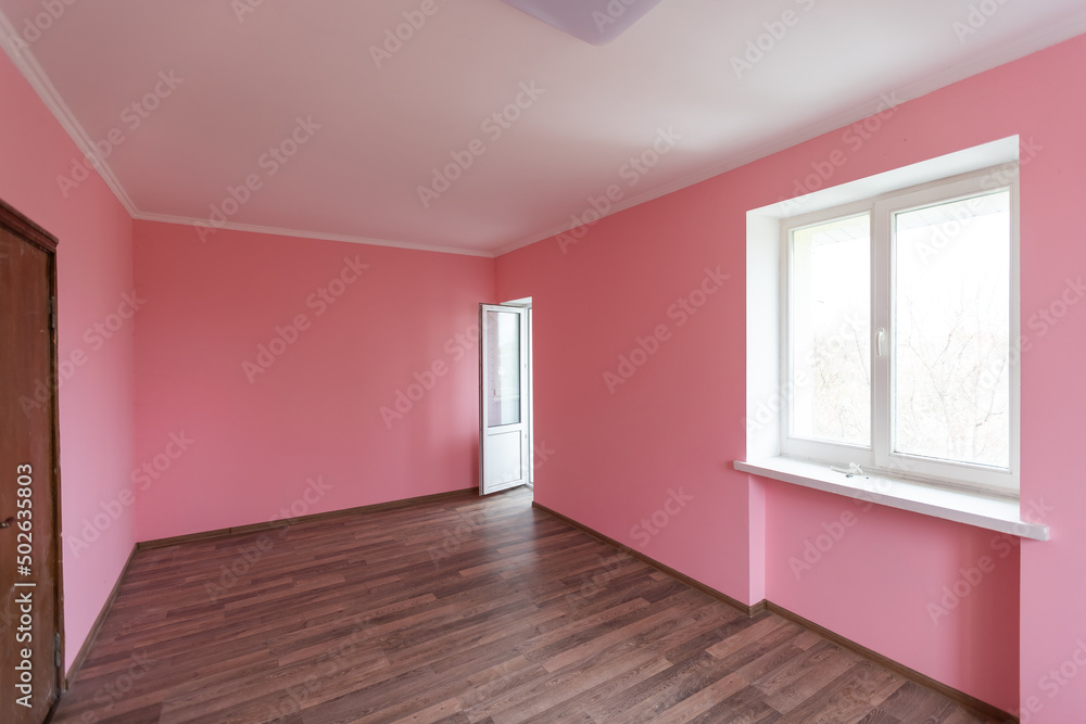 light pink color wall with modern lamp and empty concept and frame. light pink color wall with modern lamp and empty concept and frame.