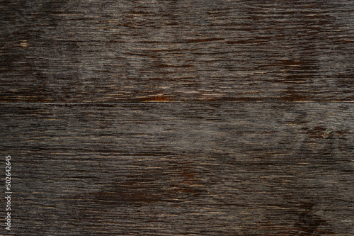 beautiful aged countertop made of natural wood of dark color
