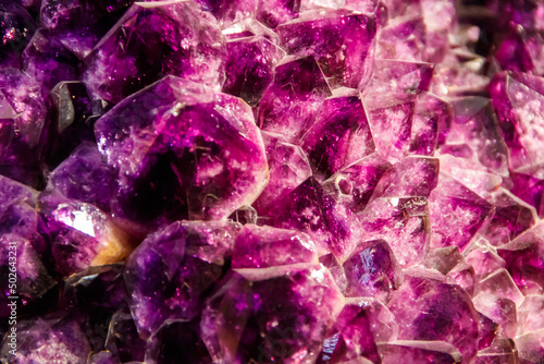 Background texture of purple amethyst gemstone