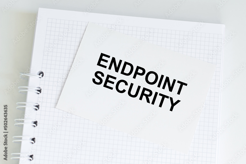 Business concept. Text ENDPOINT SECURITY on a white card on a white notepad on the table