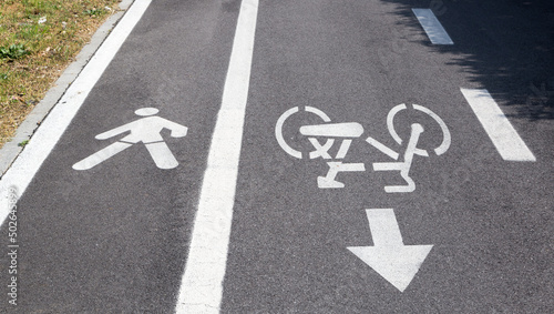 Cycle lane and pedestrian road signs photo