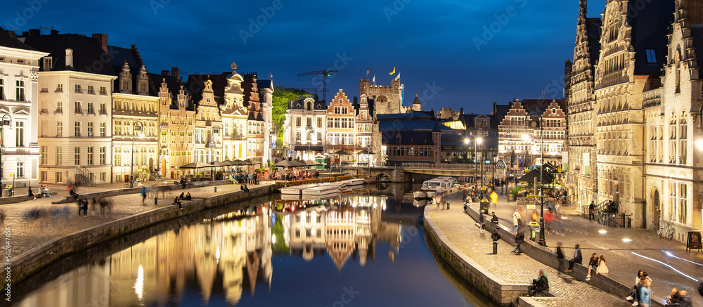 Ghent old town night skyline and Leie river panorama, Belgium
