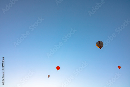Hot air balloons on the sky in the morning. Ballooning activity