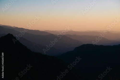 Background of soft shadows of the foggy mountains