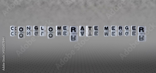 conglomerate merger word or concept represented by black and white letter cubes on a grey horizon background stretching to infinity photo