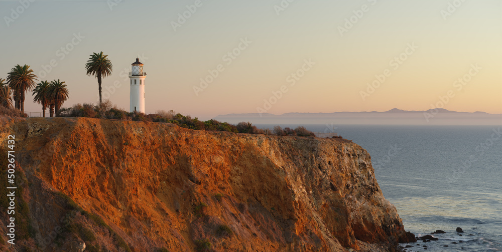 Panoramic image of the Palos Verdes Peninsula in Los Angeles County including the Point Vicente Lighthouse, shown at dusk. Santa Catalina Island is visible in the background.