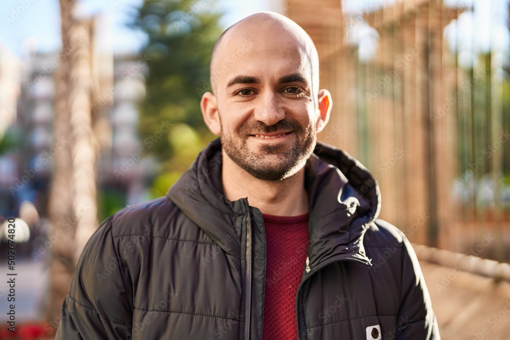 Young man smiling confident standing at street Young man smiling confident standing at street
