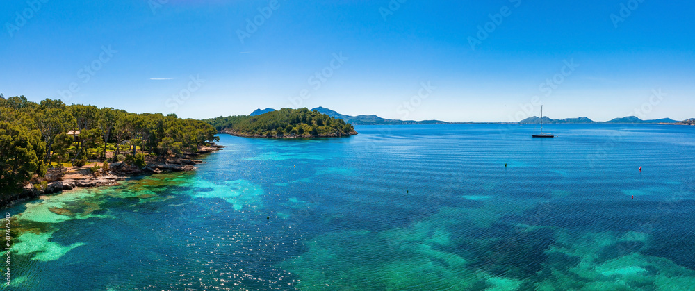 Tropical paradise beach with white sand and coco palms travel tourism wide panorama background concept