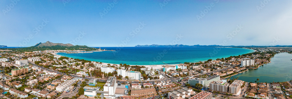 Aerial view of the beach in Palma de Mallorca with the town and harbor below beautiful coastline scenery Spain Mediterranean Sea, Balearic Islands.