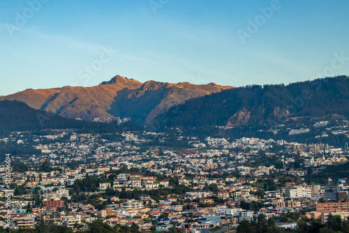 View of the city of Quito and the Rucu Pichincha volcano on a summer morning. © VictorT85