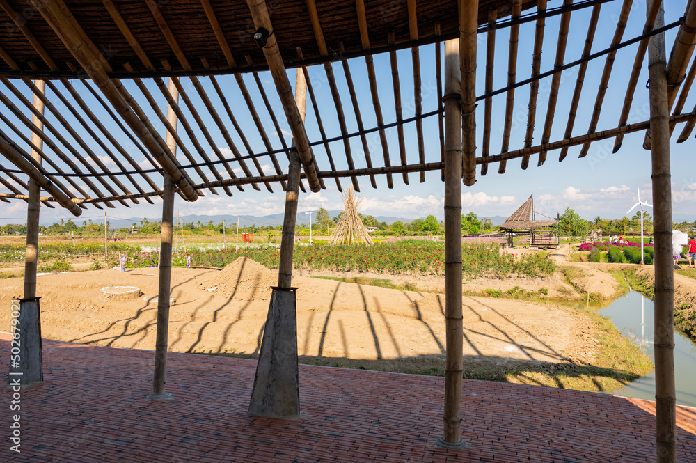 Fototapeta premium Bamboo building with flower garden in Chiangmai province