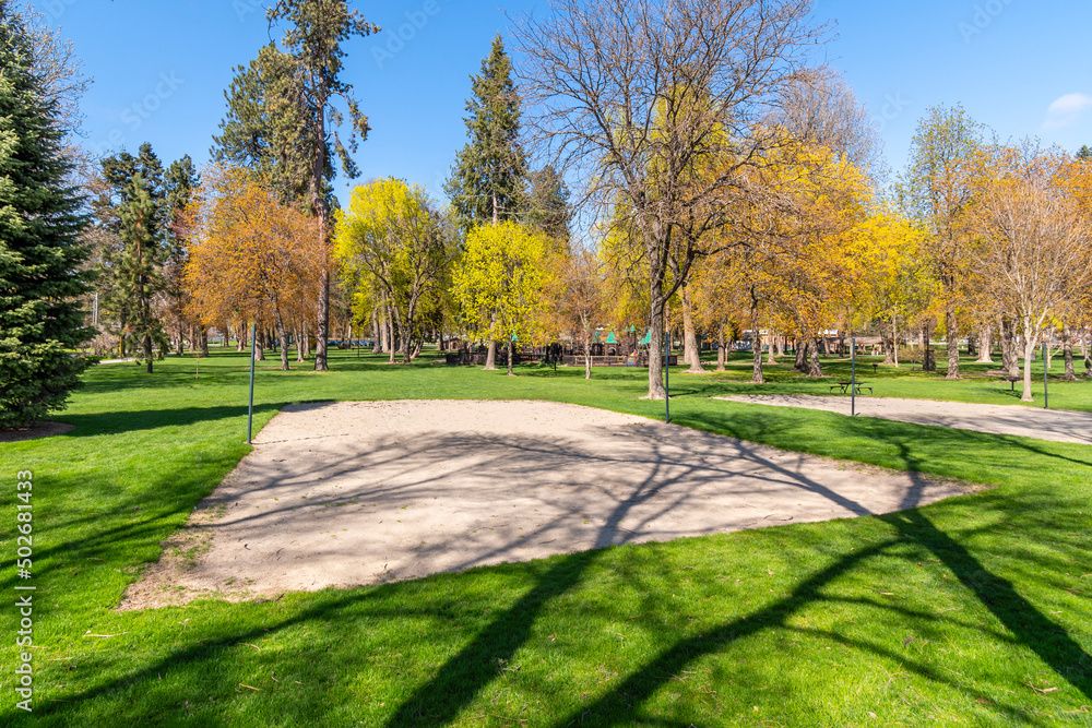 A sand volleyball court in the public city park in downtown Coeur d'Alene, Idaho USA at spring