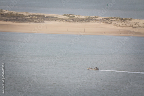 Selective blur on a bateau ostreicole plate, an oyster farming boat, sailing in the atlantic ocean waters, in bassin d'arcachon bay, in Southwestern France, a place known for oyster culture. .. photo