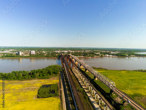  The Memphis Arkansas Memorial Bridge on Interstate 55 crossing the Mississippi River between West Memphis, Arkansas and Memphis, Tennessee..with the Frisco Bridge and Harahan Bridge in the background