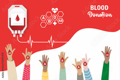Blood donation, World blood donor day. Raising hands with blood type volunteer to donate blood with ECG - EKG signal line to save patient life.