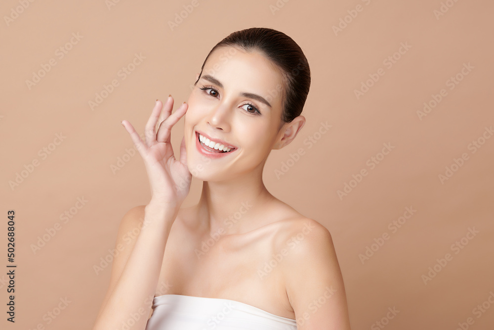 Beautiful young asian woman with clean fresh skin on beige background, Face care, Facial treatment, Cosmetology, beauty and spa, Asian women portrait. Beautiful young asian woman with clean fresh skin on beige background, Face care, Facial treatment, Cosmetology, beauty and spa, Asian women portrait.