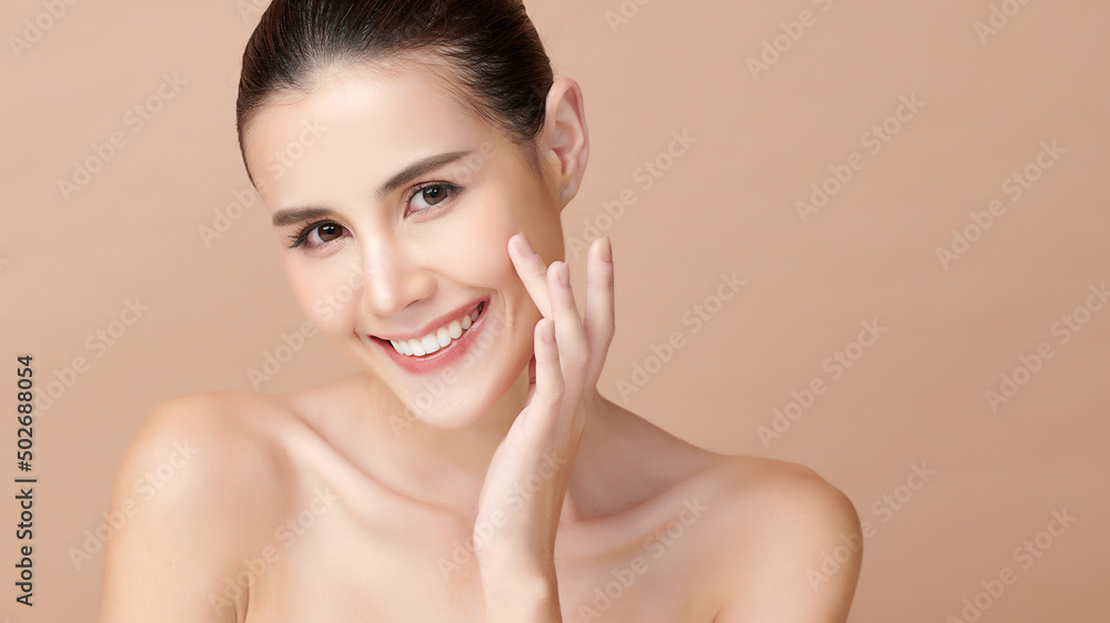 Beautiful young asian woman with clean fresh skin on beige background, Face care, Facial treatment, Cosmetology, beauty and spa, Asian women portrait. Beautiful young asian woman with clean fresh skin on beige background, Face care, Facial treatment, Cosmetology, beauty and spa, Asian women portrait.