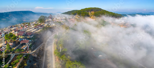Aerial view of the town mist in the sunrise sky is beautiful in the highlands of Da Lat  Vietnam