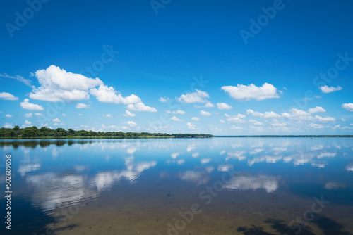 Fototapeta Naklejka Na Ścianę i Meble -  Lake Jesup reflections at Overlook Park in Seminole County, Florida