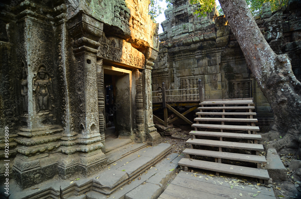 Angkor Wat temple complex, Cambodia. Beautiful view of ruins of the ancient TA Prohm temple, the place where the film Lara Croft tomb raider was shot. Royal temple of Rajavihara Angkor Wat temple complex, Cambodia. Beautiful view of ruins of the ancient TA Prohm temple, the place where the film Lara Croft tomb raider was shot. Royal temple of Rajavihara