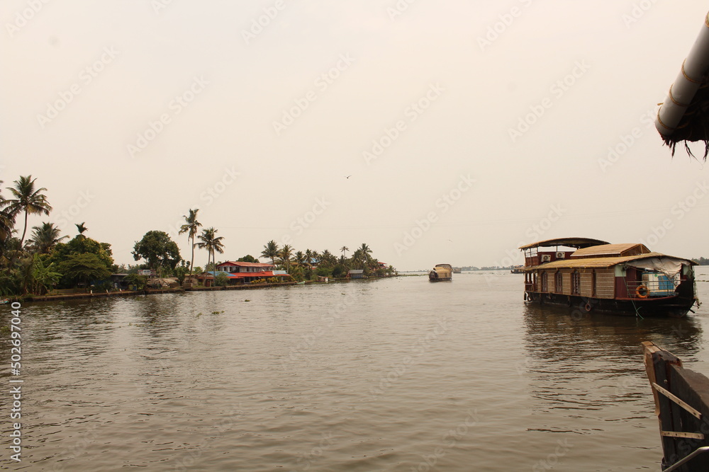 Fototapeta premium Alleppey Back Waters in Kerala, India. Houseboat trips with family