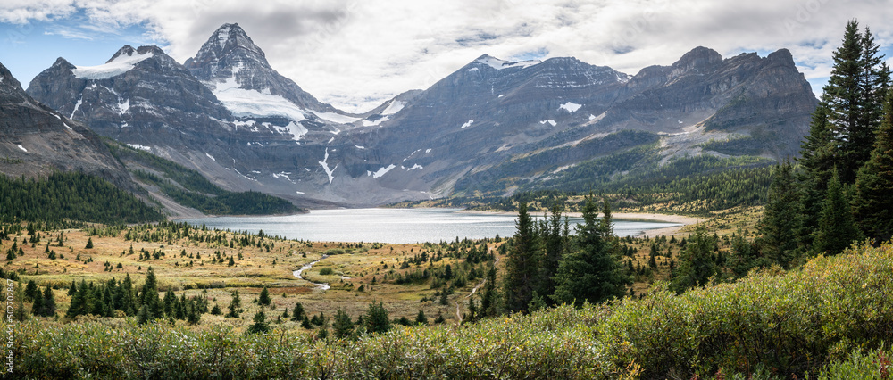 Beautiful alpine panorama with mountain range, forest and lake, Mt Assiniboine Prov. Park, Canada