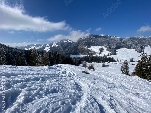 Wonderful winter hiking trails and traces on the slopes of the Alpstein mountain range and in the fresh alpine snow cover of the Swiss Alps, Nesslau - Obertoggenburg, Switzerland (Schweiz) © Mario