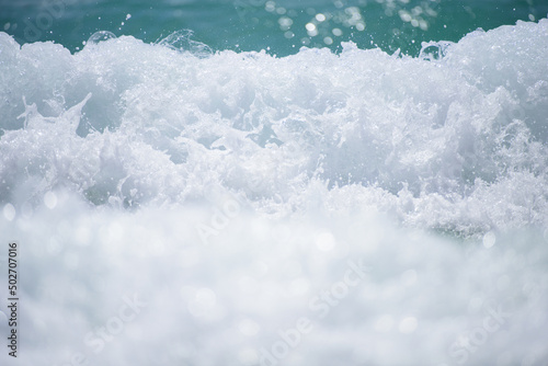 Blue calm sea in tropical beach. Tranquil ocean waves.