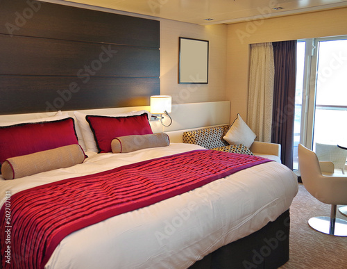 Принти на полотні Bedroom of penthouse stateroom cabin suite in clean modern interior design onboa