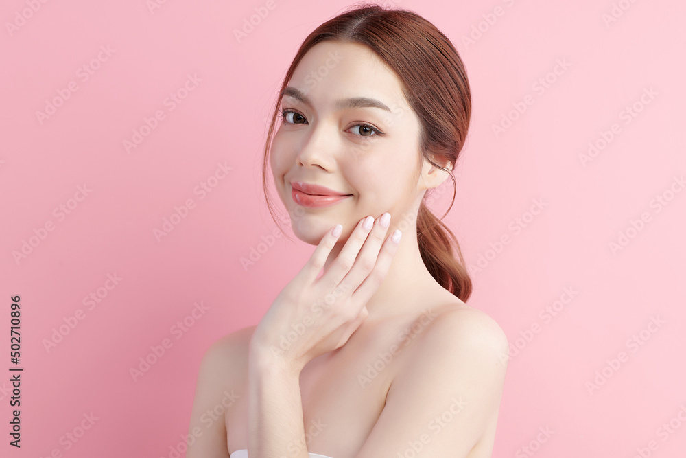 Beautiful young asian woman with clean fresh skin on pink background, Face care, Facial treatment, Cosmetology, beauty and spa, Asian women portrait. Beautiful young asian woman with clean fresh skin on pink background, Face care, Facial treatment, Cosmetology, beauty and spa, Asian women portrait.