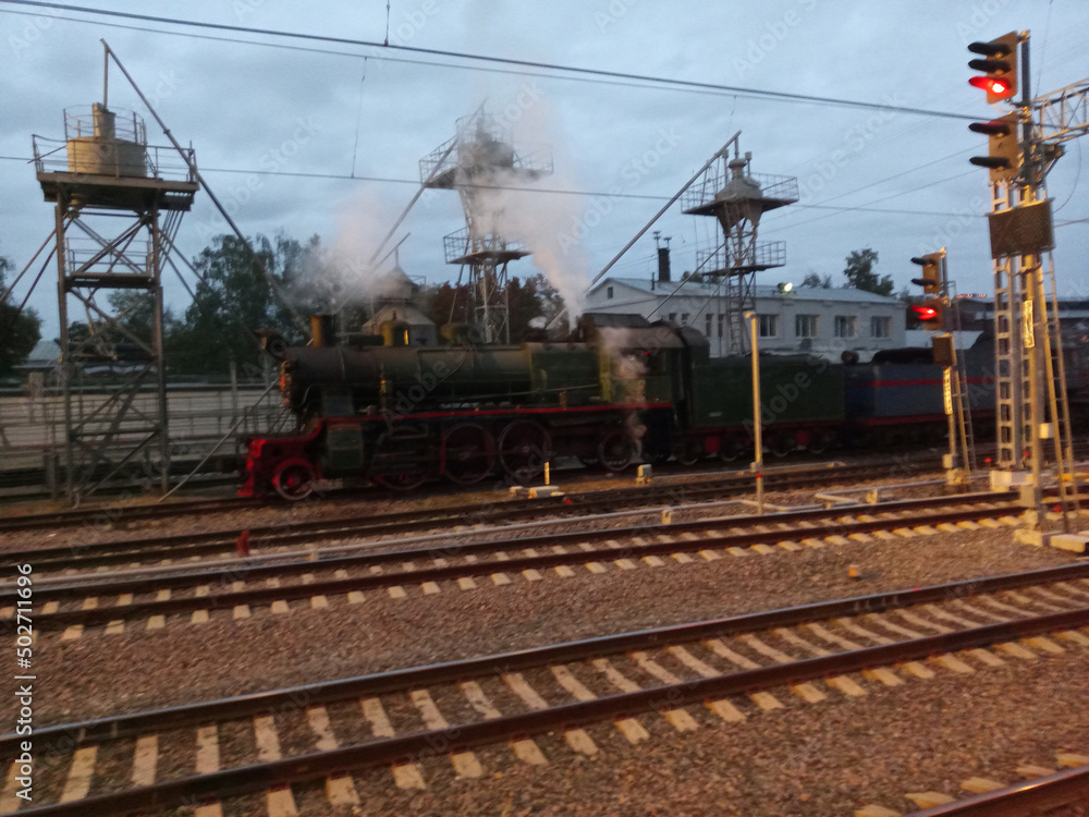 steam locomotive on rails at dry morning steam locomotive on rails at dry morning