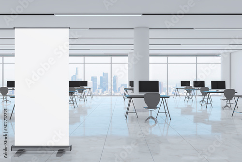 Modern bright spacious coworking office interior with empty roll up mock up poster  panoramic city view and reflections. 3D Rendering.