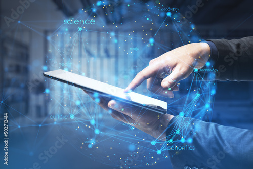 Close up of businessman hand pointing at tablet with ccreative digital linear sphere on blurry office interior background. Global network and communication concept. Double exposure. photo