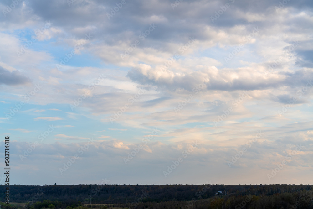 Beautiful clouds in the blue sky. Natural atmospheric background. Beautiful clouds in the blue sky. Natural atmospheric background.