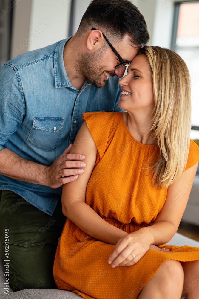 Portrait of loving couple hugging each other and spending romantic time together. Portrait of loving couple hugging each other and spending romantic time together.