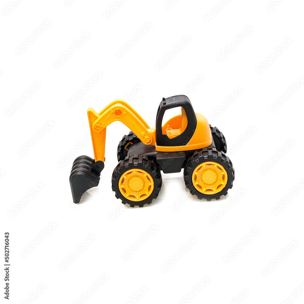 Children's toy tractor excavator yellow on white background