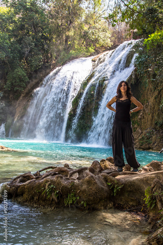 A woman tourist in Cascadas de Chifl  n  a beautiful waterfall in the park. Mexico