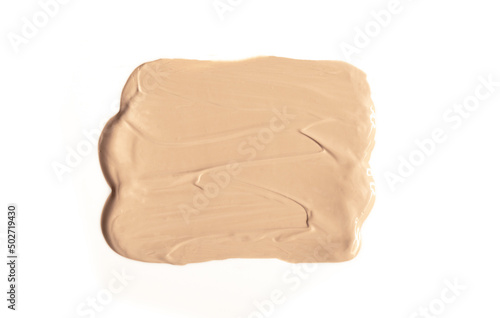 Foundation with smears as a sample on a white background. Makeup cosmetics. Tone cream. Concealer texture.