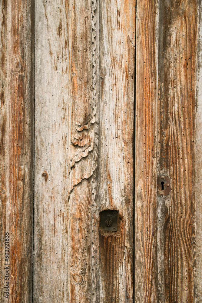 Old carved wooden door in Spain Old carved wooden door in Spain