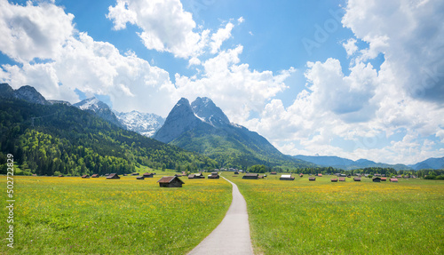Obraz na plátně idyllic hike and bike way from Gramisch to Grainau, view to Waxenstein mountain