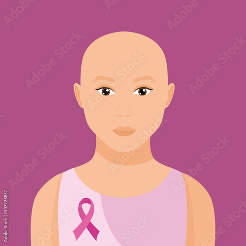 Portrait of a young woman with hairless head and breast cancer awareness ribbon