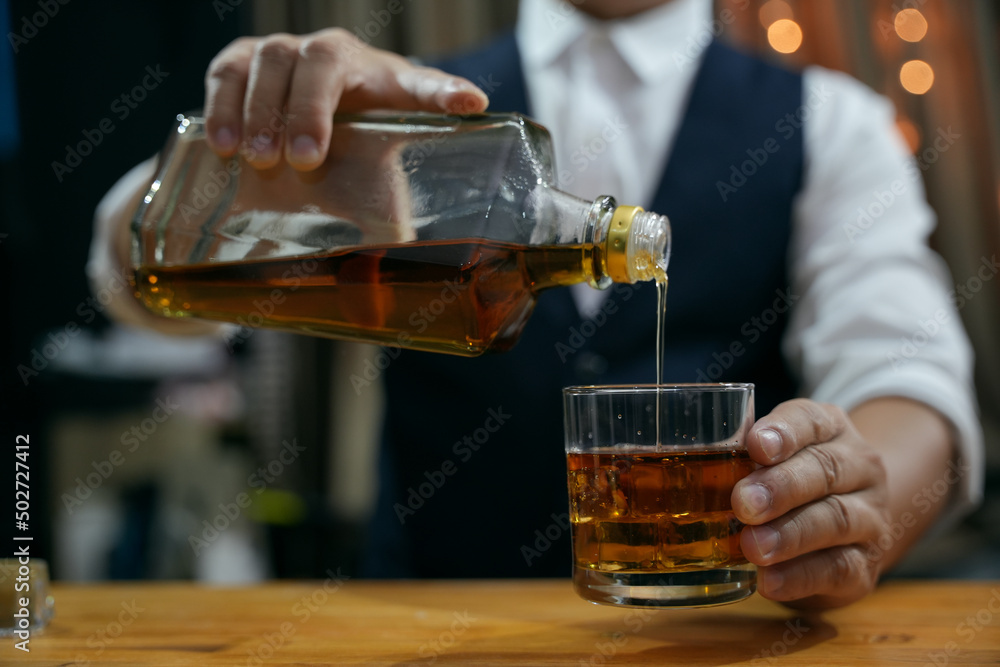 Barman pouring whiskey whiskey glass beautiful night Barman pouring whiskey whiskey glass beautiful night