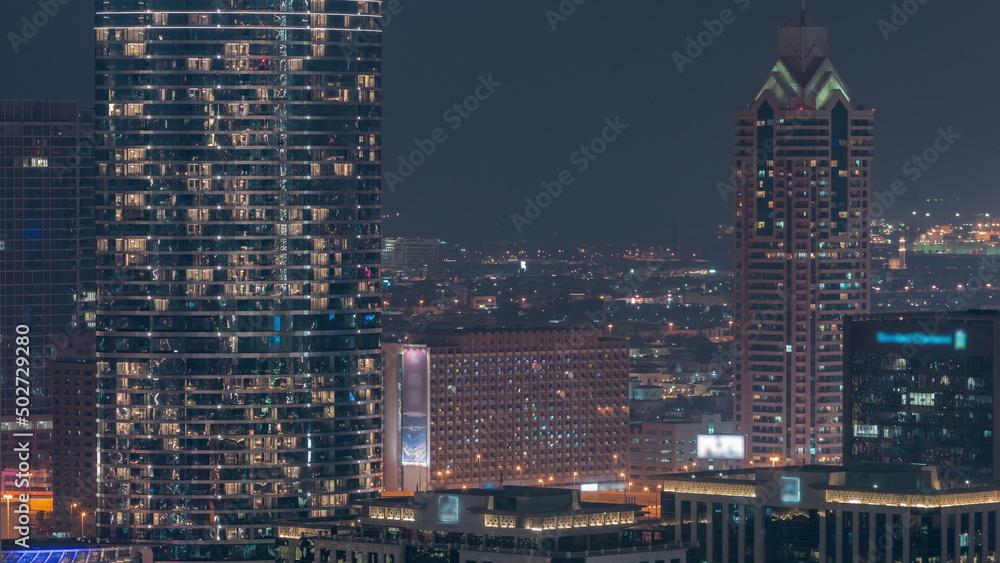 Aerial view of Dubai city night timelapse in downtown district.