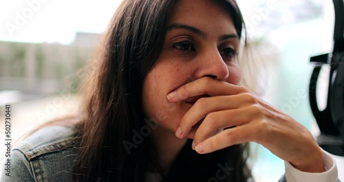 One pensive woman thinking deeply thoughtful 30s person preoccupied girl