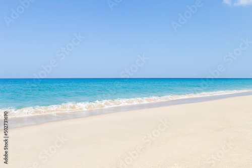 Beautiful clean sandy beach with blue sea background, tropical island in south of Thailand, tourist attraction in Khao Lak