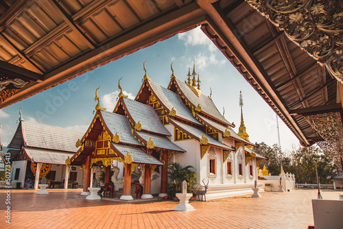 Wat Phrathat Pu Jae buddha and Huai Mae Toek lake in Phrae province, Thailand photo