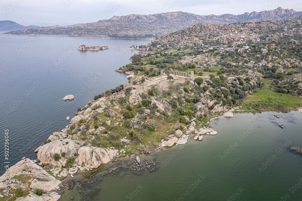 Lake Bafa is a lake and a nature reserve situated in southwestern. At the innermost north-east tip of the lake is the village of Kapikiri, as well as the ruins of Heraclea by Latmus. Lake Bafa is a lake and a nature reserve situated in southwestern. At the innermost north-east tip of the lake is the village of Kapikiri, as well as the ruins of Heraclea by Latmus.