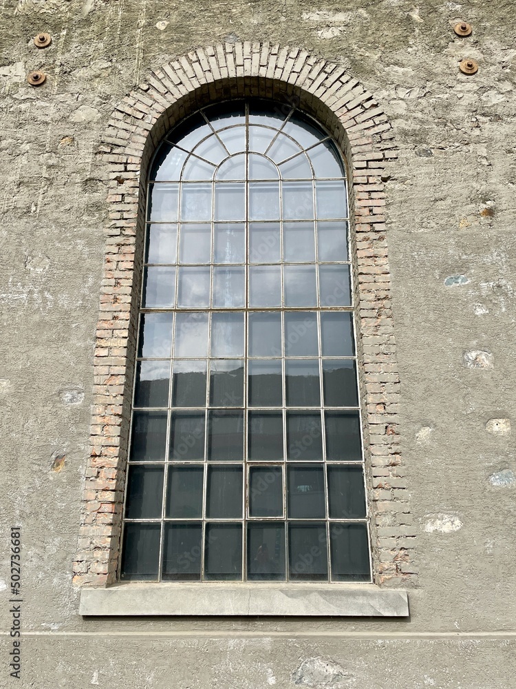 Close up of window of restored former machine factory.